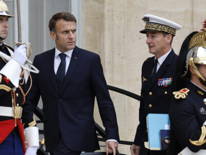 French President Emmanuel Macron (CL) walks with France's Chief of Military Staff of