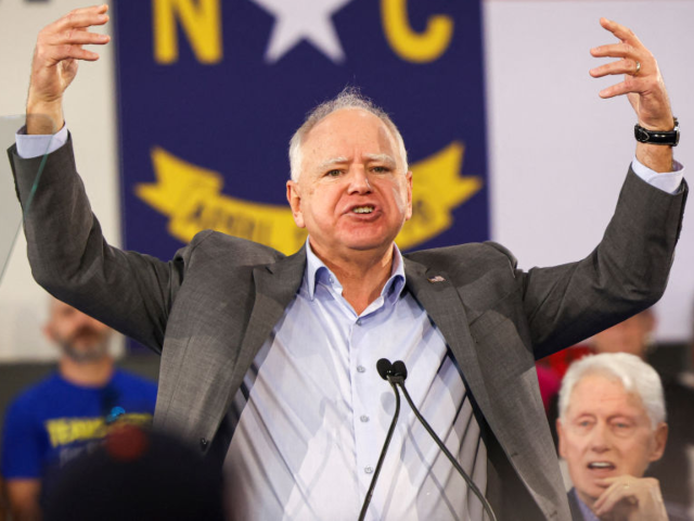 Democratic vice presidential nominee Tim Walz gestures as he speaks during a Get-Out-The-V