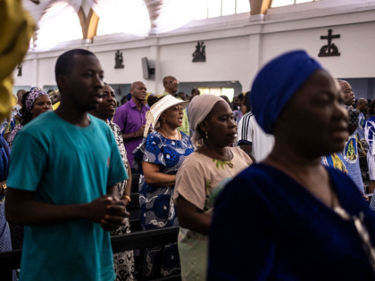 Catholics gather for a mass at the Church of the Assumption in Lagos on April 21, 2025. Af