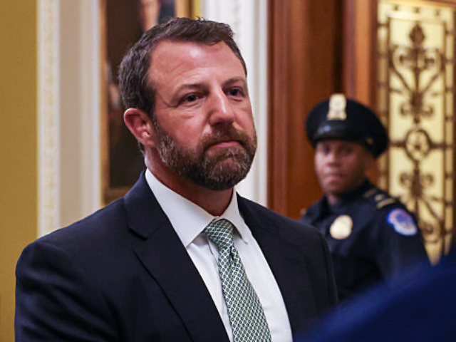 GettyImages-2224776937 Senator Markwayne Mullin, a Republican from Oklahoma, speaks to visitors during a vote-a-r