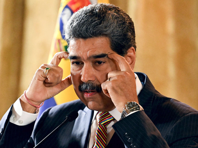 Venezuela's President Nicolas Maduro gestures as he speaks during a meeting at the Nationa