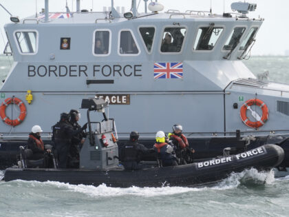 Migration minister Seema Malhotra (right) travels on a rigid inflatable boat (RIB) alongsi