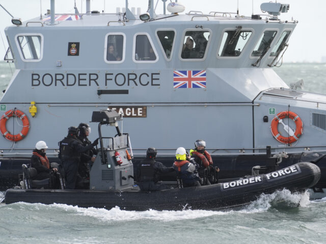 Migration minister Seema Malhotra (right) travels on a rigid inflatable boat (RIB) alongsi