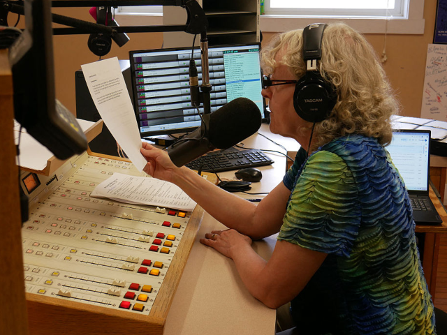 Volunteer Bonnie Ralston hosts a show in the Allegheny Mountain Radio studio, in Monterey,