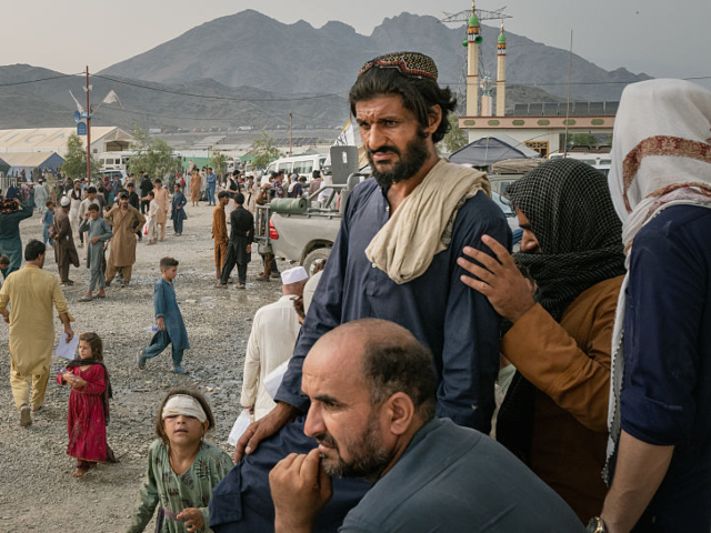 TORKHAM, AFGHANISTAN - SEPTEMBER 15: Afghan migrants apply for a registration card at the
