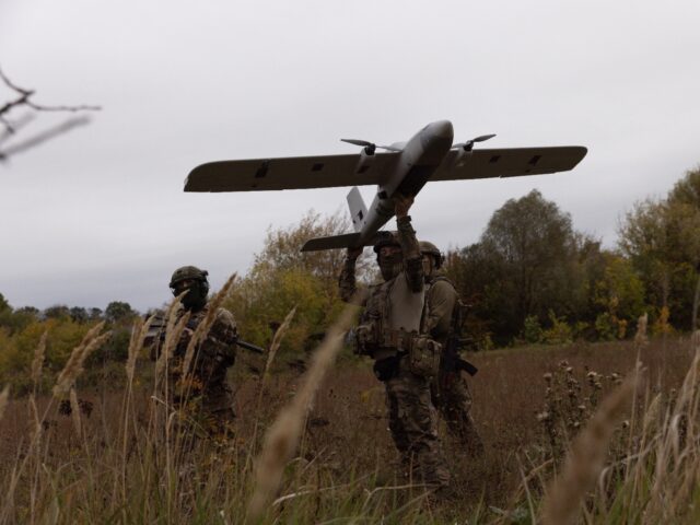 KHARKIV OBLAST, UKRAINE - SEPTEMBER 24: Ukrainian soldiers prepare the UAV 'Evanger' for l