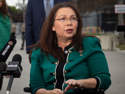 BROADVIEW, ILLINOIS - OCTOBER 10: U.S. Sen. Tammy Duckworth (D-IL) speaks to the press alo