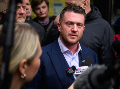LONDON, ENGLAND - OCTOBER 13: Stephen Yaxley-Lennon, known as Tommy Robinson, speaks to su
