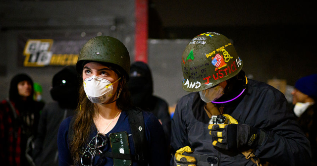 
                            DHS Warns Portland Anti-ICE Protesters: Mask Ban Is In Effect Around Federal Facilities