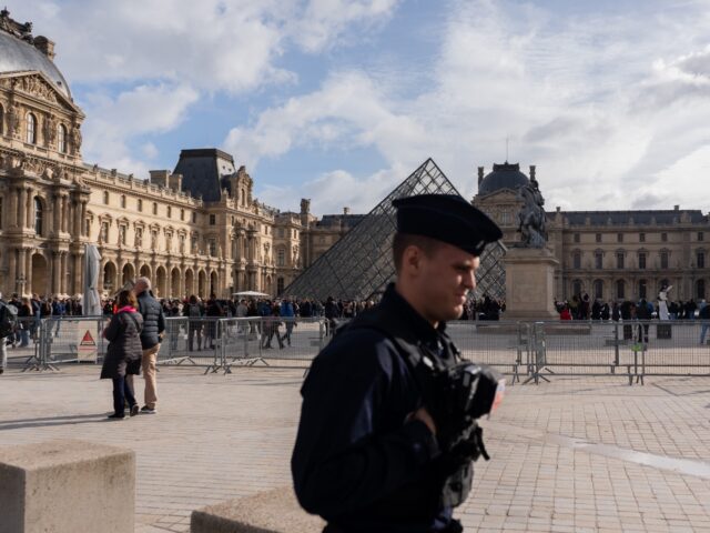 A police officer at the Louvre Museum in Paris, France, on Monday, Oct. 27, 2025. France's