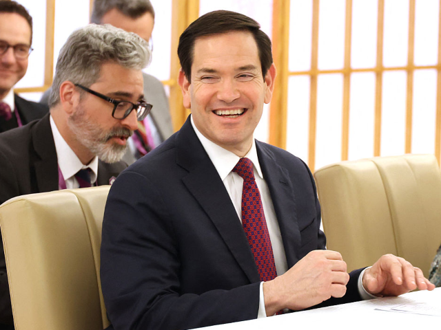 GettyImages-2243327146 US Secretary of State Marco Rubio smiles as he talks with his Japanese counterpart Toshimi