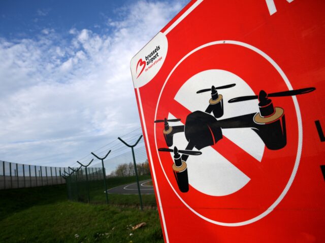 This photograph shows a sign reading "No drone zone" at Brussels Airport in Zaventem on No