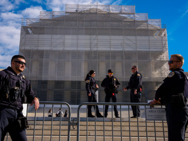 WASHINGTON, DC - NOVEMBER 5: Police officers stand guard outside the Supreme Court on Nove