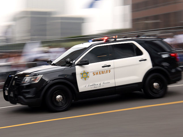 LOS ANGELES, CALIFORNIA - NOVEMBER 03: A Sheriff's vehicle drives the parade route before