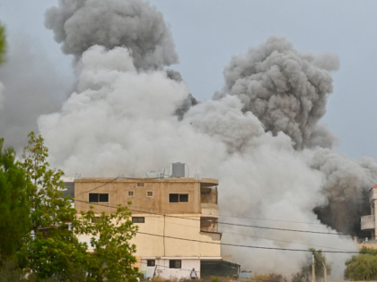 Smoke rises from the site of an Israeli airstrike that targeted the southern Lebanese vill