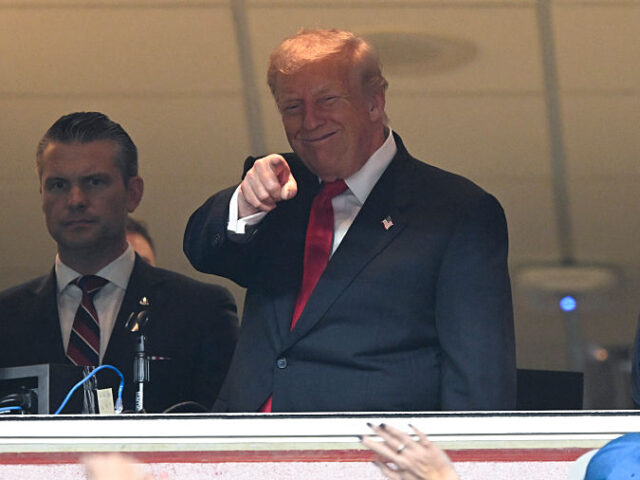 LANDOVER, MARYLAND - NOVEMBER 9: (L-R) Secretary of War Pete Hegseth, U.S. President Donal