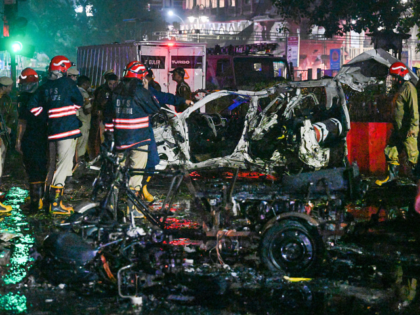 NEW DELHI, INDIA - NOVEMBER 10: Vehicles destroyed in a blast near the Red Fort Metro Stat