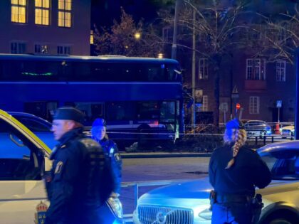 STOCKHOLM, SWEDEN - NOVEMBER 14: Police officers stand near a cordoned-off area as a doubl