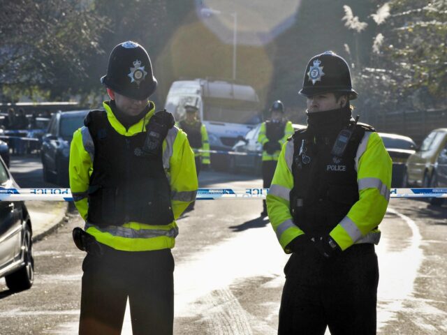 Police outside the entrance to the flat where Joanna Yeates used to live on Canynge Road,