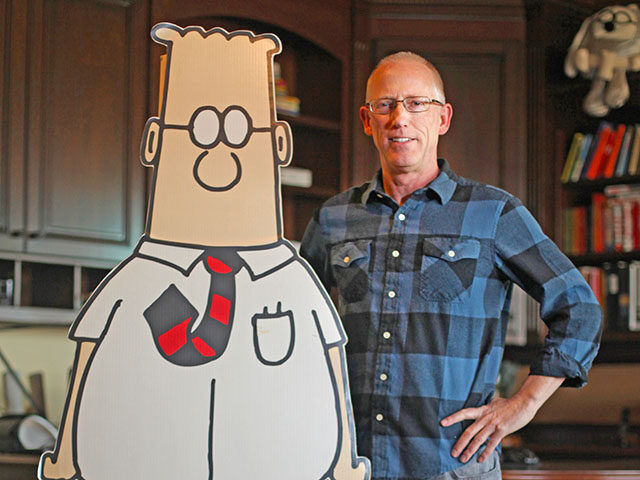 Scott Adams, cartoonist and author and creator of "Dilbert", poses for a portrait with a l