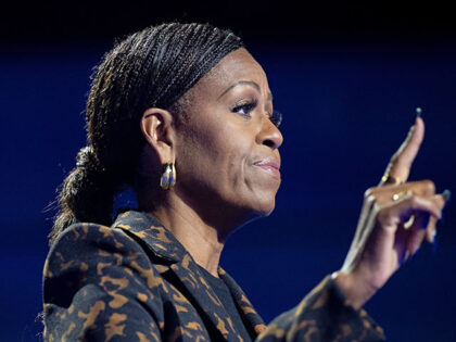 Former US First Lady Michelle Obama speaks during a campaign rally with US Vice President