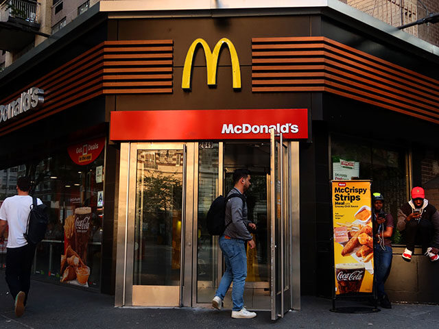 A person enters a McDonald's restaurant on Broadway on June 11, 2025, in New York City. (P