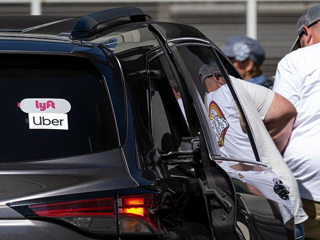 Uber and Lyft signage on a vehicle at San Francisco International Airport (SFO) in San Fra