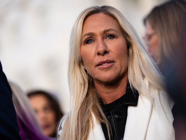 Rep. Marjorie Taylor Greene, pictured, R-Ga, Rep. Ro Khanna, D-Calif., and Rep. Thomas Mas