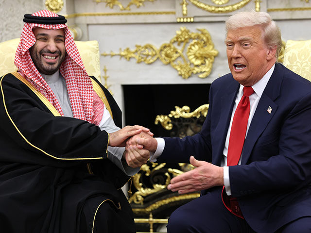 GettyImages2247326217 U.S. President Donald Trump (R) takes the hand of Crown Prince and Prime Minister Mohammed