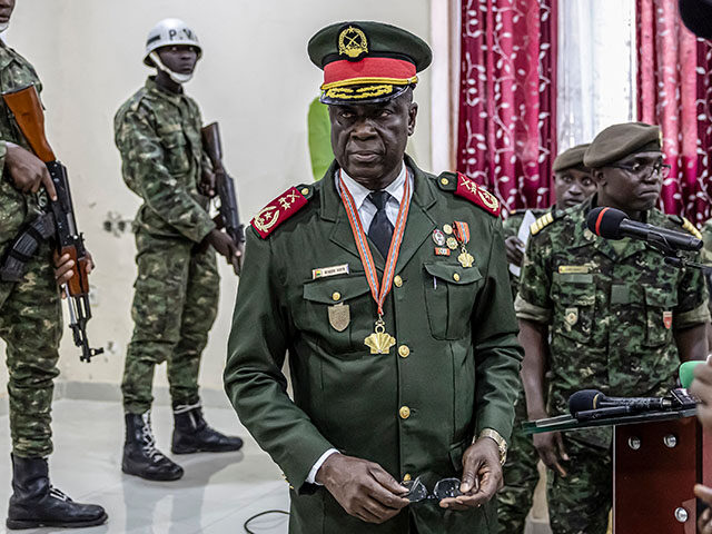 Guinea Bissau Army general Horta N'Tam looks on during the swearing in ceremony as the tra