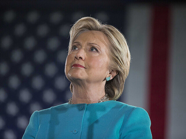 Hillary Clinton, 2016 Democratic presidential nominee, listens on stage during a campaign