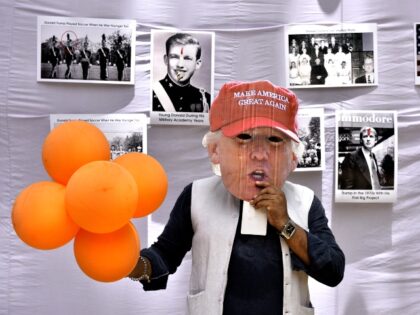 Indian man wearing a Trump mask