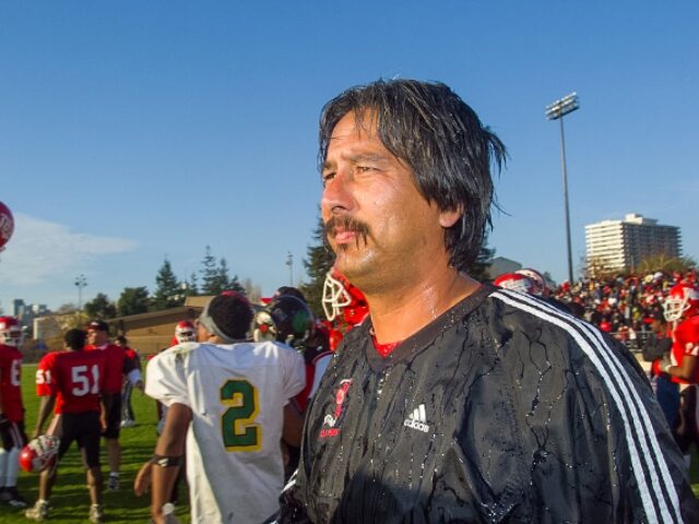 Skyline football coach John Beam drenched after Skyline High School beats Fremont High Sch