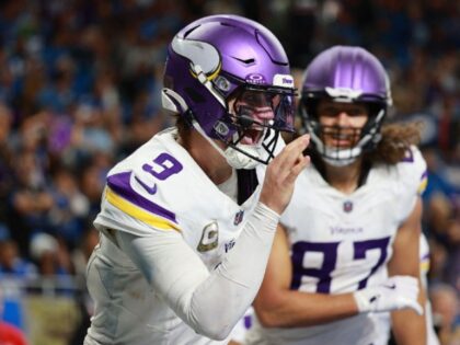 DETROIT,MICHIGAN-NOVEMBER 2: Minnesota Vikings quarterback J.J. McCarthy #9 celebrates aft