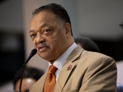 Reverend Jesse Jackson, president and founder of the Rainbow PUSH coalition, holds a news
