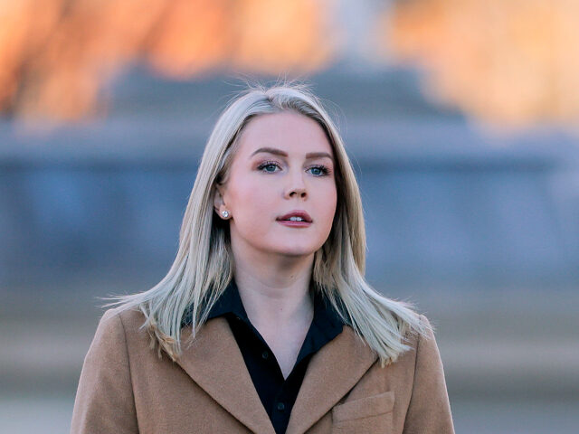 WASHINGTON, DC - NOVEMBER 24: Press Secretary Karoline Leavitt approaches reporters outsid