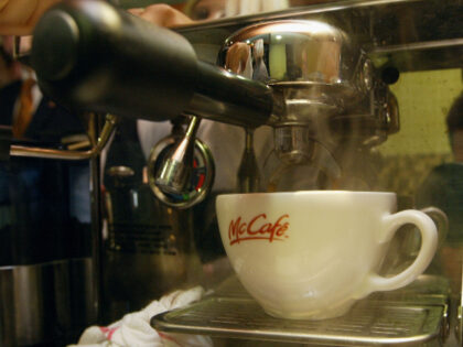 A cup is filled with hot coffee at the opening of a new McCafe coffeehouse December 3, 200