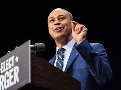 Democrat Jay Jones speaks on stage at an election night watch party for Democrat Abigail S
