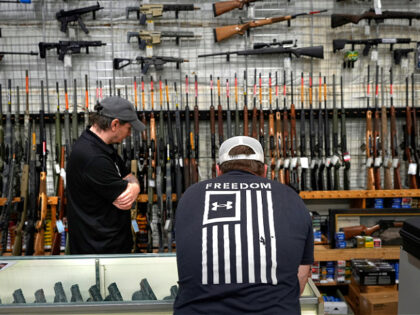 A customer shops at Maine Military Supply, Tuesday, Nov. 4, 2025, in Holden, Maine. (AP Ph