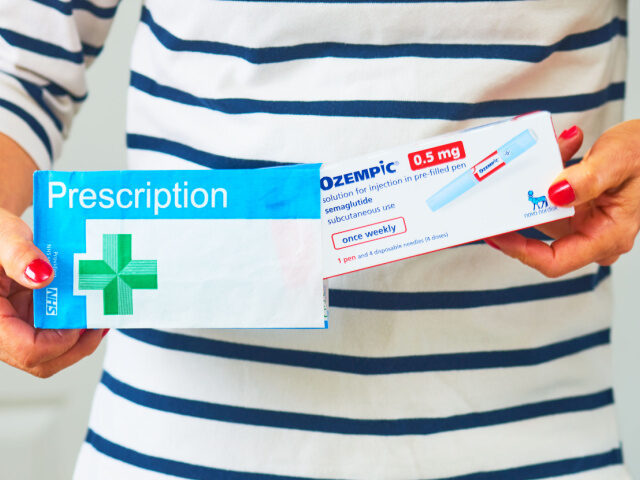 A photo illustration of a box containing an Ozempic injection pen on October 20, 2025 in L