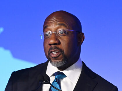 Raphael Warnock speaks onstage during attends the Wisconsin Democrats 2025 Convention at C