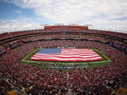 LANDOVER, MD - SEPTEMBER 07: A general view as a giant United States flag is unfurled on t