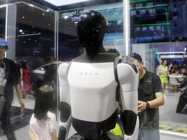 Elon Musk Plans to End Prisons by Having His Robots Follow Crooks and Stop Them from ‘Doing C