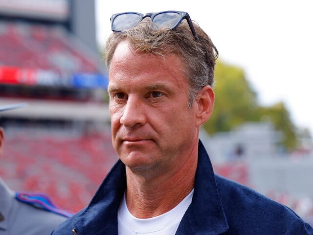 ATHENS, GEORGIA - OCTOBER 18: Head coach Lane Kiffin of the Mississippi Rebels walks the f