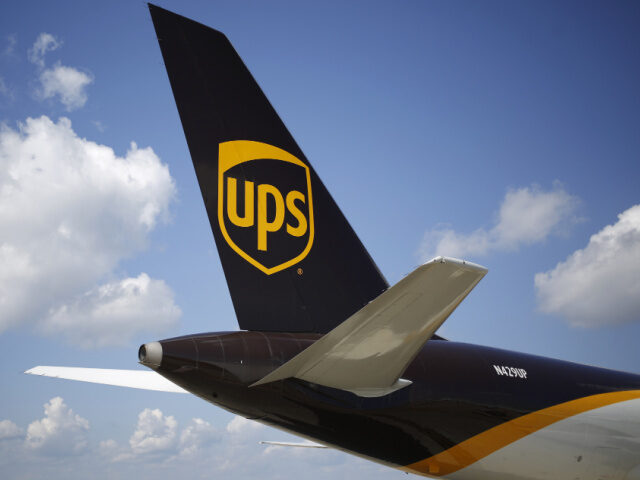 he tail section of a cargo jet is seen at the United Parcel Service Inc. (UPS) Worldport f