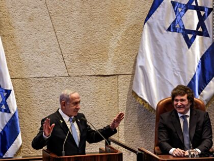 Argentina's President Javier Milei (R) looks on as Israel's Prime Minister Benjamin Netany