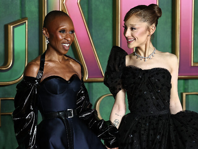 British actor Cynthia Erivo (L) and US actor Ariana Grande (R) pose on the red carpet upon