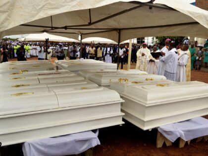 Coffins of 17 worshippers and two priests, who were allegedly killed by Fulani herdsmen st