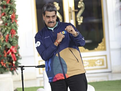 CARACAS, VENEZUELA - NOVEMBER 21: Venezuela's President Nicolas Maduro dances during the s