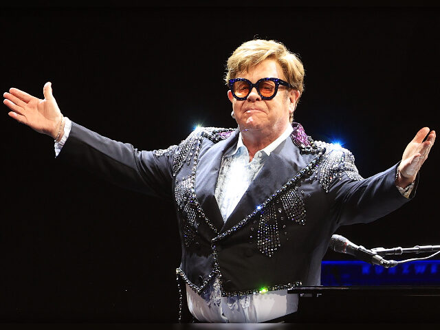 LIVERPOOL, ENGLAND - MARCH 23: (EDITORIAL USE ONLY) Elton John performs during the first U